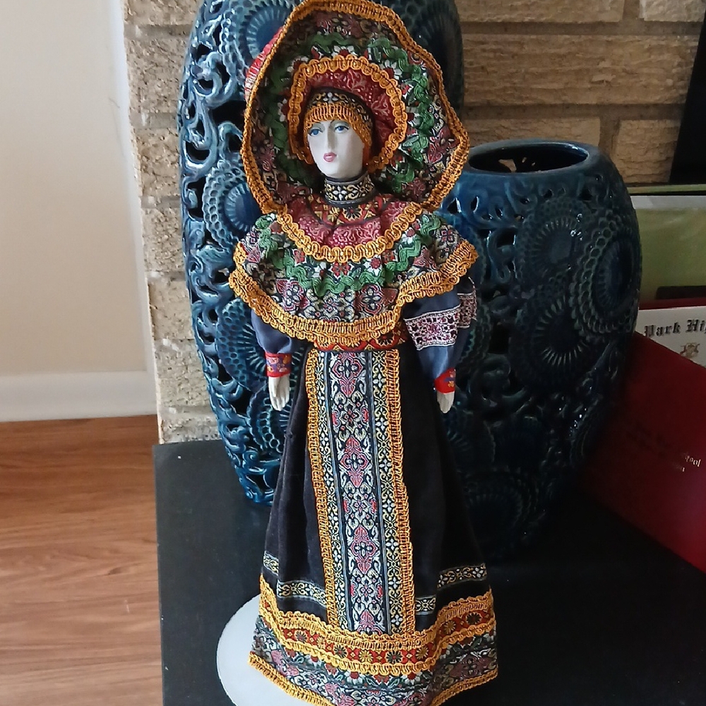 Traditional Folk Art Doll with Vibrant Accents